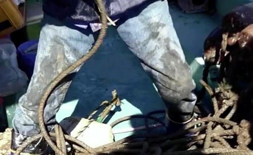 タコつぼ漁の漁師のジーンズ